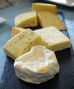 A selection of Shetland Cheese, with St. Ninians in the foreground.