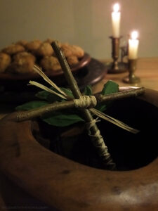 wooden cross with basil