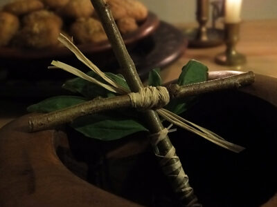 wooden cross with basil
