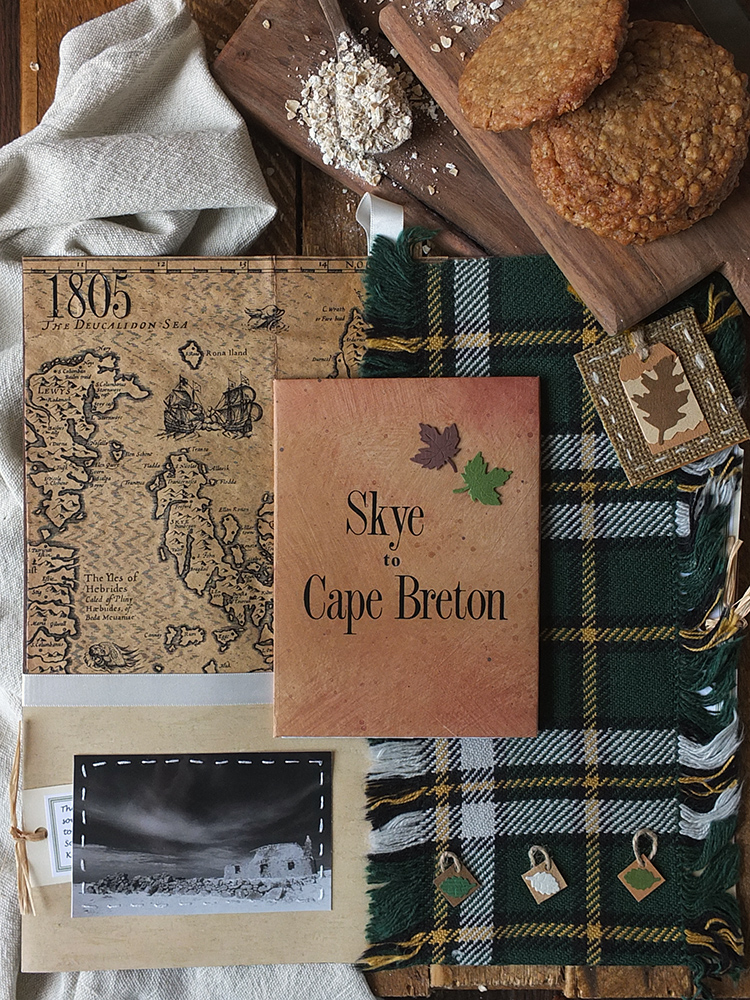 Image of Cape Breton genealogy scrapbook page with hand woven Cape Breton tartan by Elizabeth Grant.