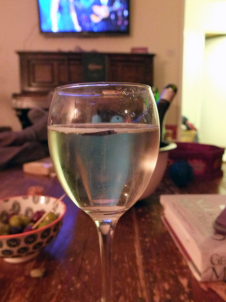 Glass of prosecco with 125 ml line marked