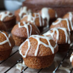 Close up image of Mini Pumpkin Spice Muffins with a Maple Syrup Drizzle.