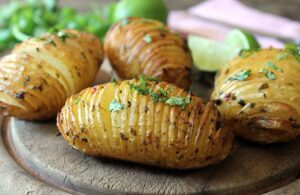 Hasselback Potatoes with Chilli and Lime Butter by Veggie Desserts