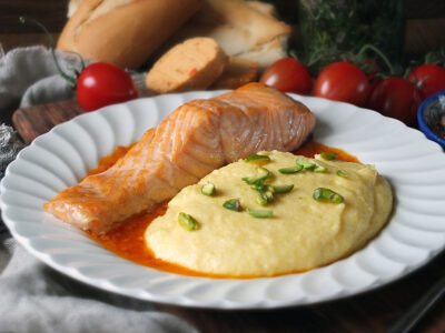 Grilled Salmon with Creamy Polenta with Pistachios and Tomato Butter