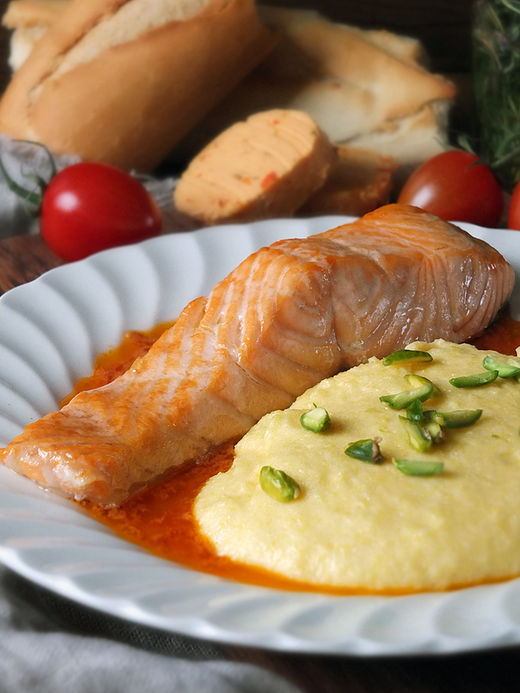 Grilled Salmon with Creamy Polenta with Pistachios and Tomato Butter