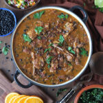 Lamb feijoada with mango salsa