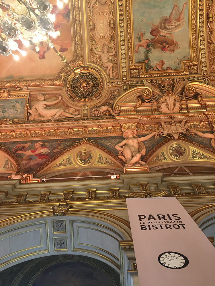 Image of the very opulent ceiling decorations in the Paris City Hall.