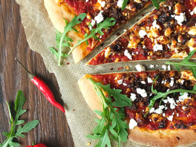 Spicy Lamb Pizza with Feta, Rocket and a Yogurt Drizzle