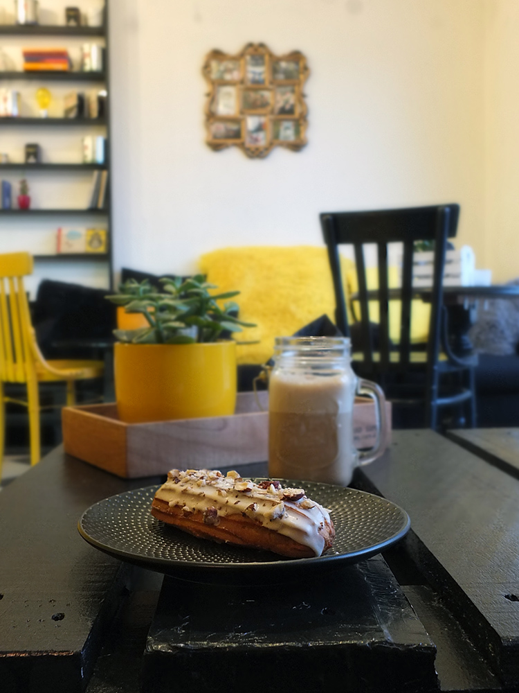 Hazelnut and Maple Syrup Eclair at The Fat Cat Cafe Riga Latvia