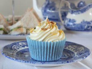 Raspberry Filled Vanilla Cupcakes with White Chocolate Frosting