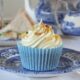 Raspberry Filled Vanilla Cupcakes with White Chocolate Frosting