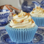 Raspberry Filled Vanilla Cupcakes with White Chocolate Frosting