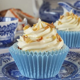 Raspberry Filled Vanilla Cupcakes with White Chocolate Frosting