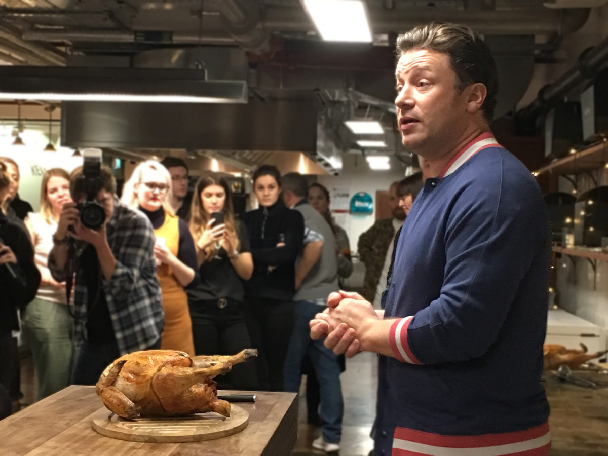 Image of Jamie Oliver about to show us how to cook a turkey.