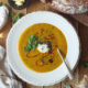 This delicious and warming spicy carrot soup contains seven different store-cupboard spices, as well as fresh ginger and garlic. It freezes and reheats well too, so you can batch cook it if you've got a glut of carrots. #carrotsoup #soup #elizabethskitchendiary