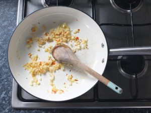 cooking onions and chilli on gas