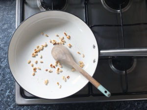 toasting pinenuts on a gas hob