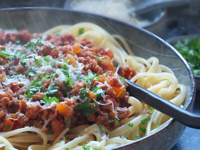 Lamb bolognese with linguine and Parmesan on top