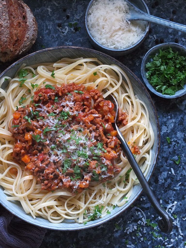 bolognese with linguine and Parmesan on top