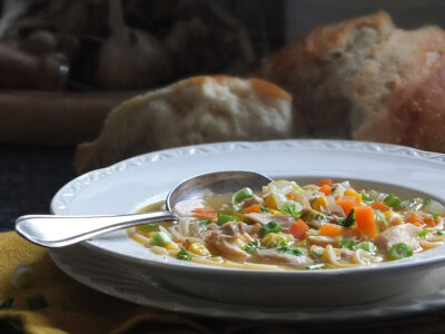 Chicken noodle soup with spoon image