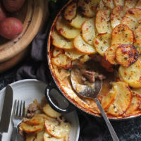 Succulent slow-cooked lamb and onions in gravy sandwiched between two layers of thinly sliced potatoes.