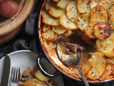 Succulent slow-cooked lamb and onions in gravy sandwiched between two layers of thinly sliced potatoes.