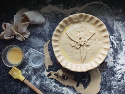 image of uncooked pie pastry brushed with egg wash ready for the oven