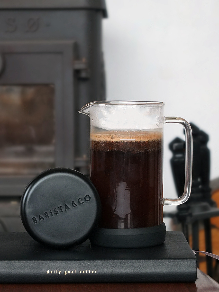 single serve coffee maker filled with brewing coffee image