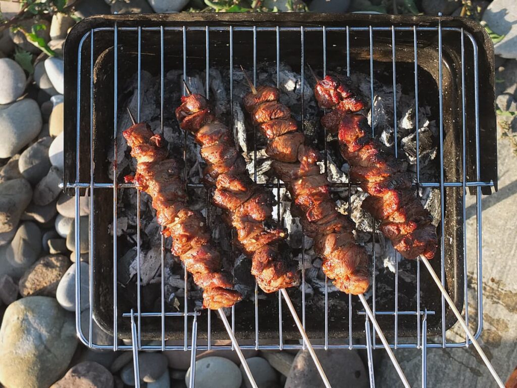 Photo of marinated lamb skewers on the barbecue.