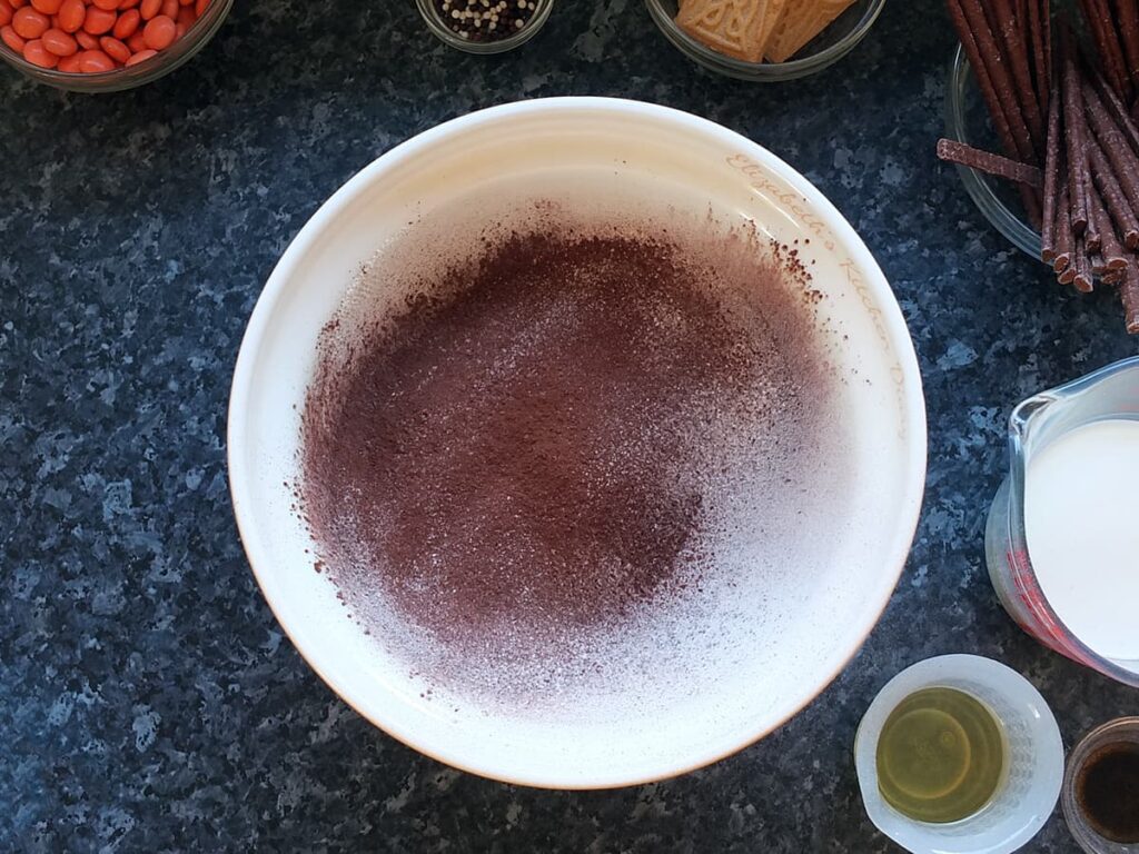 Image of first step in cake baking - sieve dry ingredients.