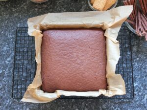 Image of step 7 - baked cake cooling on a wire rack.