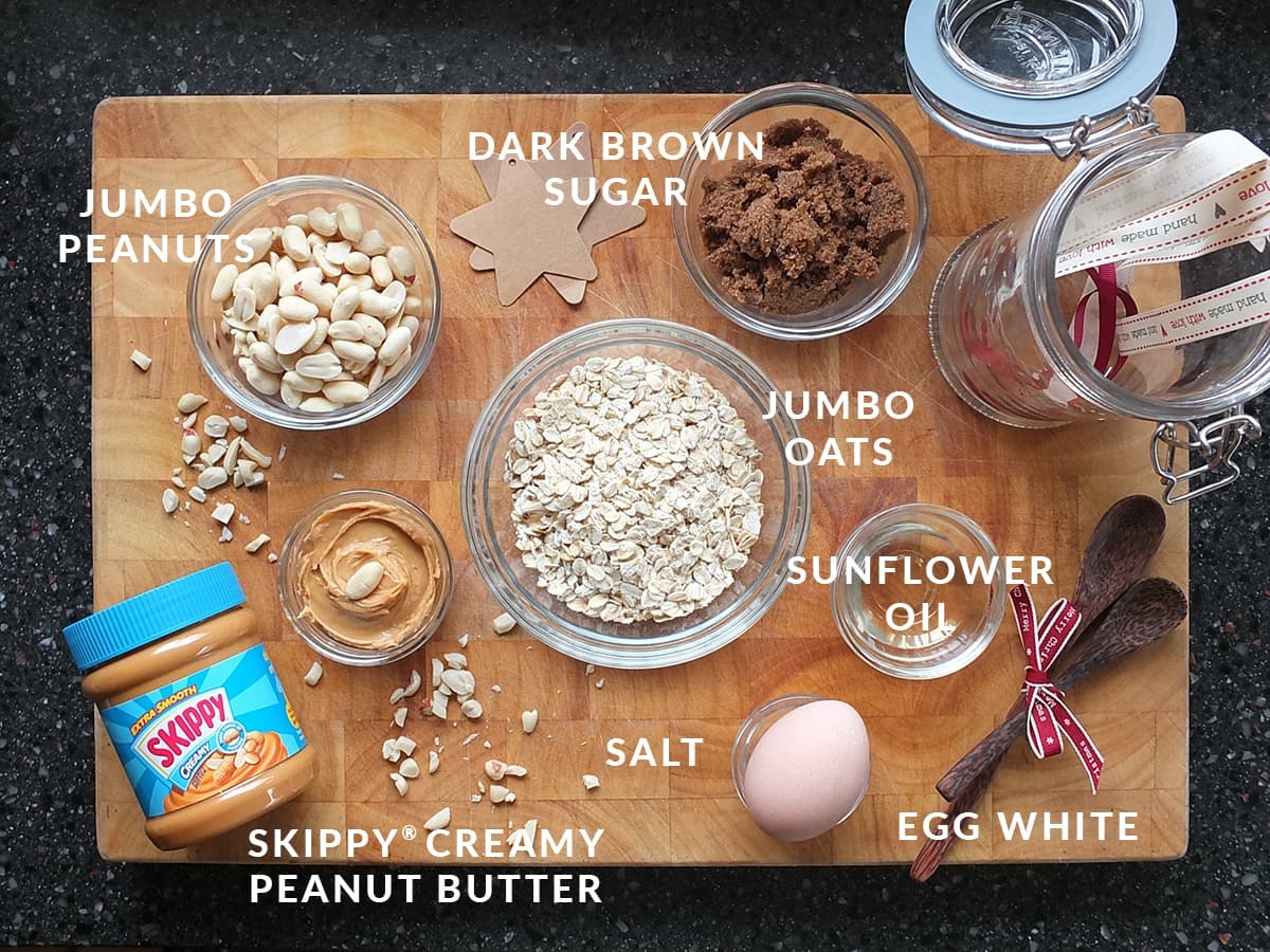 Top down image of all the ingredients needed to make peanut butter granola clusters.