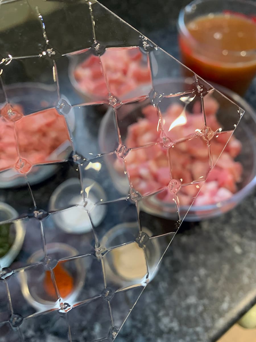 Image of leaf gelatine showing off the tiny diamond shapes on its surface. It's rather pretty, like a window.