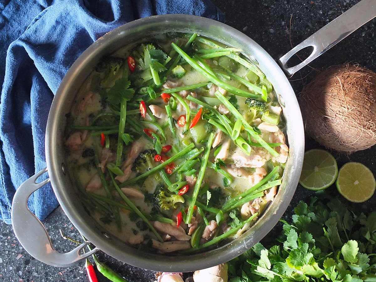Top down image of Thai green curry in a saute pan, ready to be served. 
