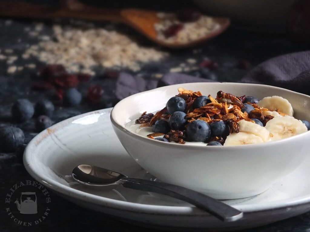 Photo of crunchy cricket granola served with yoghurt and fruit.