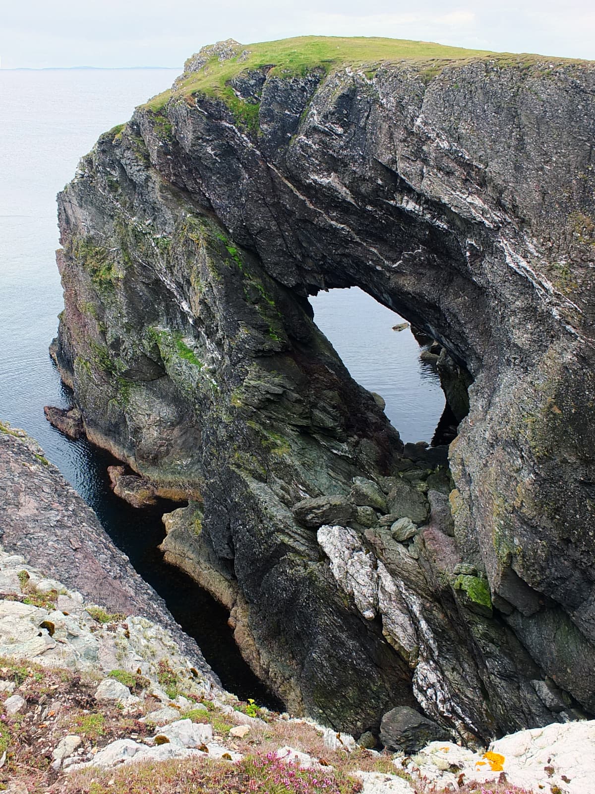 Image of a dramatic natural sea arch in Fetlar.