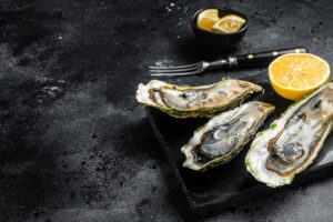 Elizabeth's Kitchen Diary header image for seafood recipes, showing a plate of oysters.