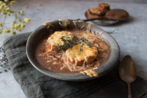 Elizabeth's Kitchen Diary category header image for soup recipes showing a bowl of French onion soup.