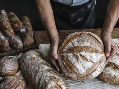 Elizabeth's Kitchen Diary category header image for bread recipes showing many loaves of rustic sourdough bread.