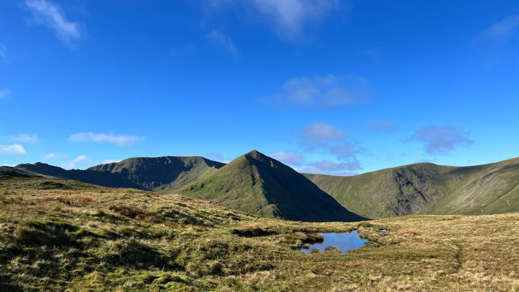 Image of Catstye Cam from Birkhead Moor showing its characteristic perfect pyramid mountain shape.
