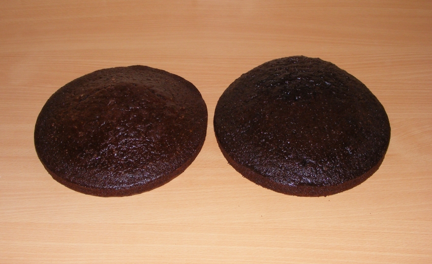 Image of two nine inch round chocolate cakes.