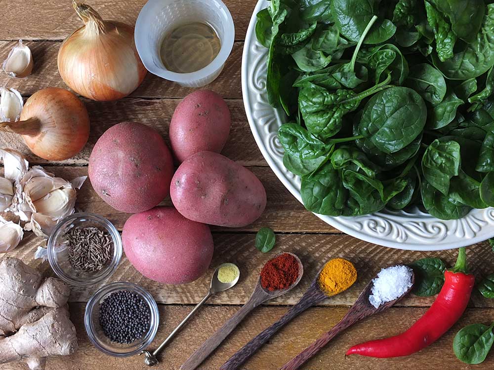 Ingredients for spinach and potato curry