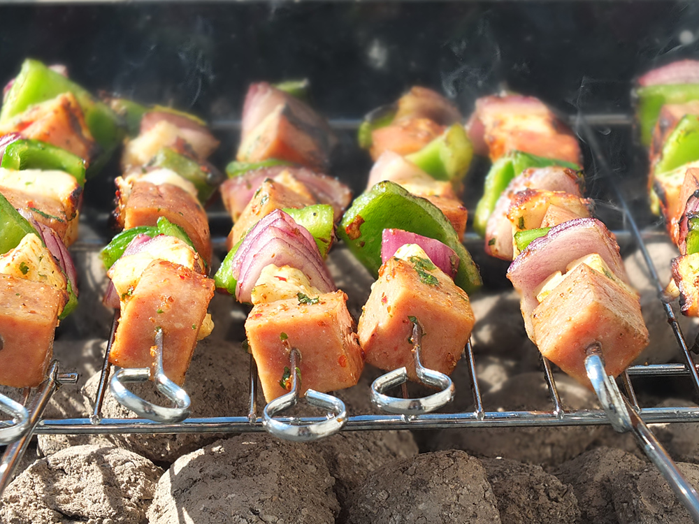 This SPAM® BBQ kebab recipe is super easy to whip up for any last minute BBQs you might be hosting this summer. Cubes of squeaky Halloumi cheese marinaded in chilli, parsley, cumin and coriander are threaded onto skewers with red onion, green pepper and sizzling SPAM®
